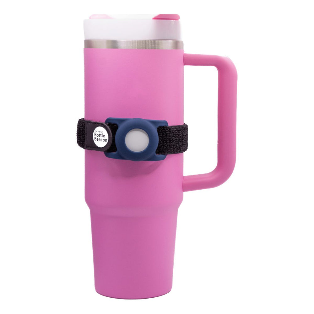 Dark Blue Bottle Beacon strap holding an Apple AirTag on a pink Stanley tumbler